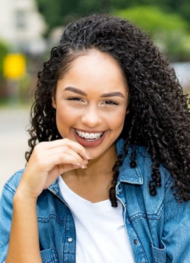 Woman smiling with braces