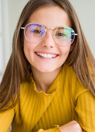 Young girl receiving dental exam