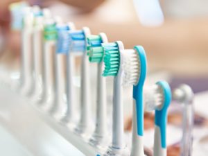 lined up heads for toothbrushes 