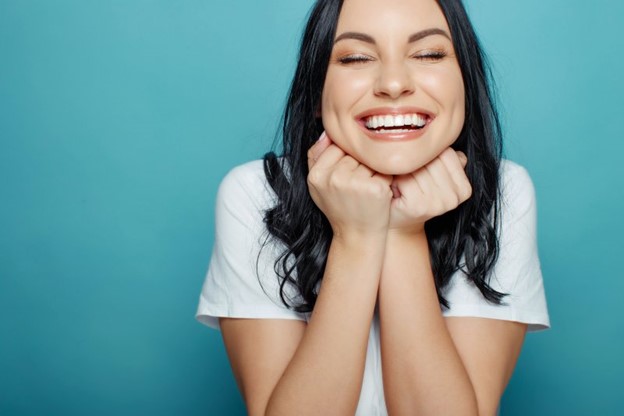 Woman showing off her smile.