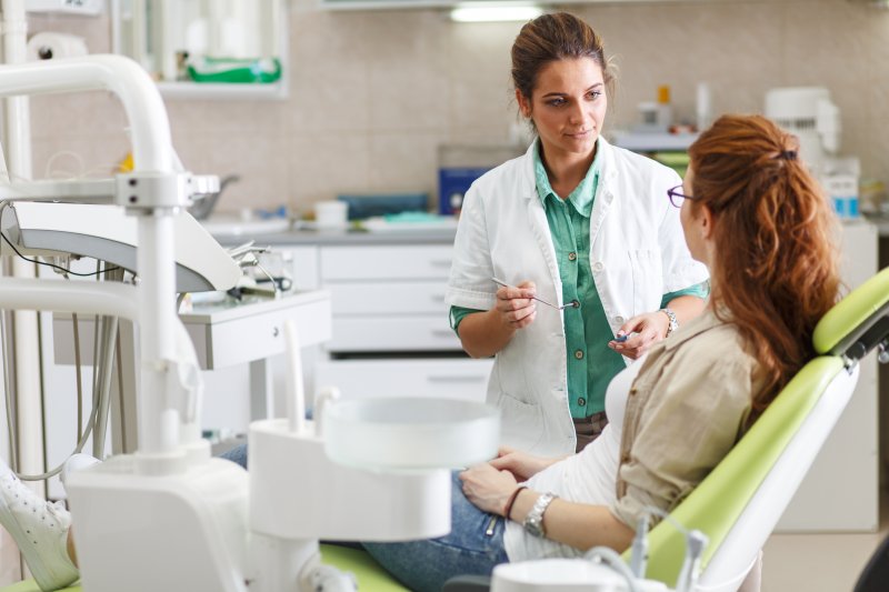 patient talking to their dentist